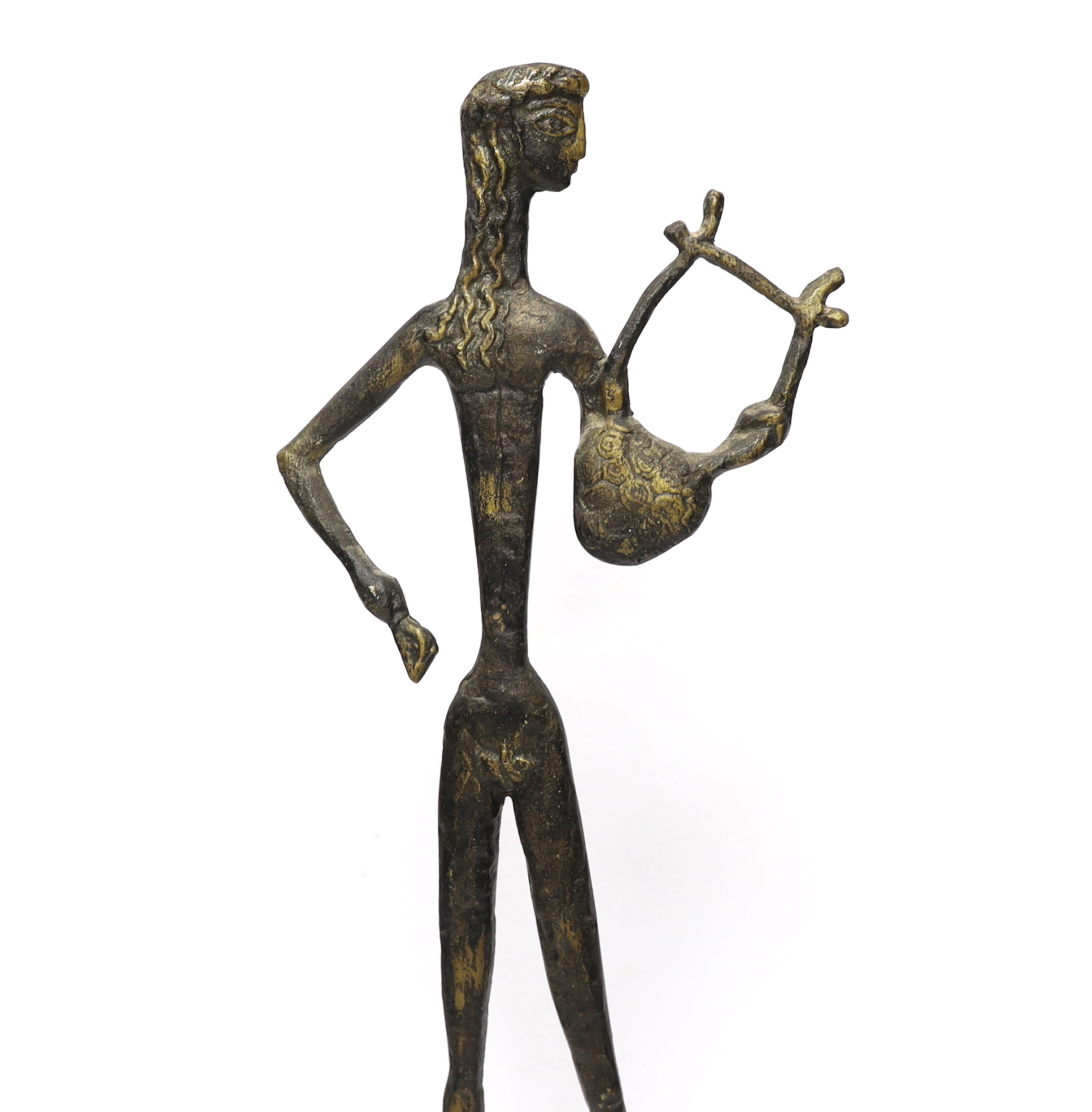 A bronzed figure of a stylised male, 54cm high